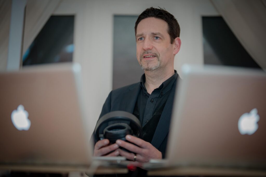 DJ Method creator Angus Atherton-Palmer preparing for a live performance at the DJ booth.